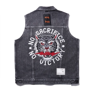 Streetwear grey wash denim vest featuring heavy tiger embroidery and graphic text