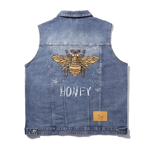 Men's oversized denim vest featuring detailed bee embroidery and text on back
