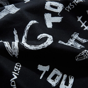 Oversized black cotton sweatshirt featuring white graffiti lettering street style design