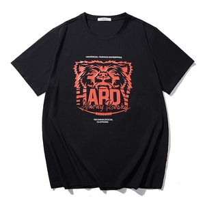 Men's loose black cotton T-shirt featuring a bold orange roaring bear graphic print