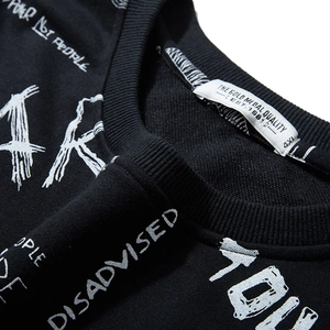 Black street style sweatshirt featuring white graffiti lettering and ribbed crewneck