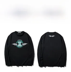 Detail of bear with wings graphic print on black long sleeve crewneck cotton t-shirt