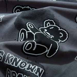 Deep grey oversized sweatshirt with street style cartoon bear and KNOWN print detail