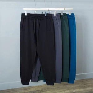 Men's minimalist jogger pants with drawstring waist and ribbed cuffs in four colors
