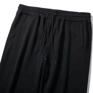 Men's casual black joggers with elastic drawstring waist and side pockets