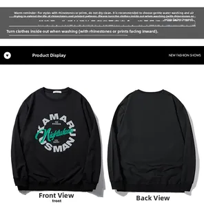 Détail d'un sweat-shirt noir à col rond avec logo artistique Lightwave vert imprimé