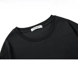 Detail of crewneck sweatshirt collar with ribbed texture and 3XL size label tag