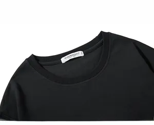 Close-up of ribbed neckline on black cotton sweatshirt featuring 3XL size label