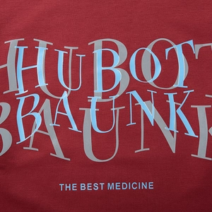 Oversized burgundy sweatshirt with geometric artistic letters and The Best Medicine print