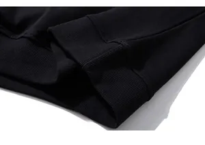 Close-up of black hoodie sleeve with high-density ribbed cuff and reinforced stitching