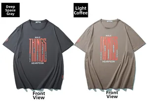 Vue détaillée de t-shirts oversize gris anthracite et café clair avec impression graphique