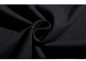 Macro shot of high-quality black cotton knit fabric texture with soft vertical weave