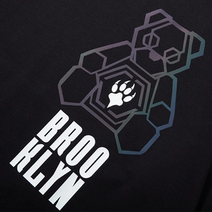 Black T-shirt with iridescent geometric bear print and Brooklyn letter graphics