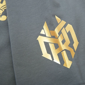Loose fit dark grey cotton T-shirt featuring a premium metallic gold foil graphic print