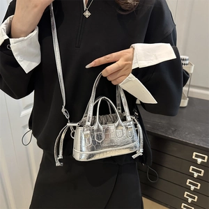 Silver metallic crocodile pattern mini bucket bag with top handles and shoulder strap