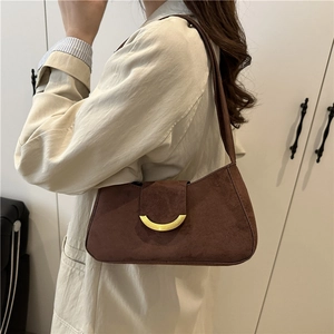 Vintage minimalist coffee brown suede underarm bag with a golden crescent metal buckle