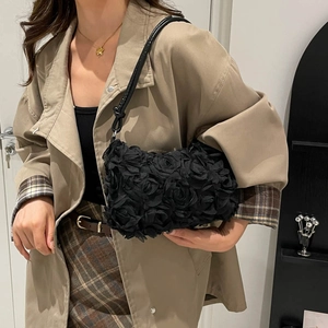 Chic black 3D rose flower handbag for women with adjustable leather shoulder strap
