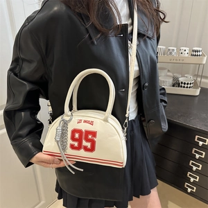 White semi-circular Los Angeles 95 crossbody bag with red stripes and metal charm