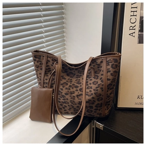Detailed view of leopard print tote bag set with matching brown small storage pouch
