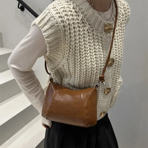Retro brown crossbody square bag for women in vintage faux leather with tied strap detail