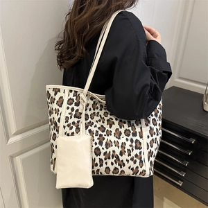 Retro leopard print tote bag with matching coin purse shown on a model for daily use