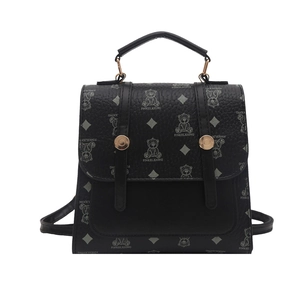Retro black leather polka dot backpack for women with bear print and gold buckles