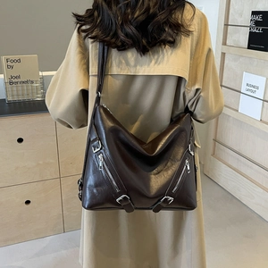 Minimalist large brown hobo tote bag with silver zippers and punk style details