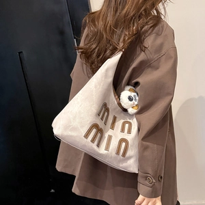 Retro minimalist large capacity tote bag in beige canvas with brown leather trim detailing