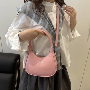 Chic pink patent leather crescent hobo bag for women with adjustable shoulder strap