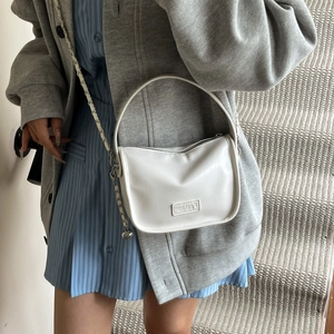 Minimalist white faux leather square crossbody bag with Fashion label and chain strap
