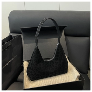 Chic leopard print crescent underarm bag displayed in premium gift box with soft textures