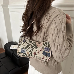 Floral embroidered underarm bag with dragonfly pattern and elegant metal chain strap