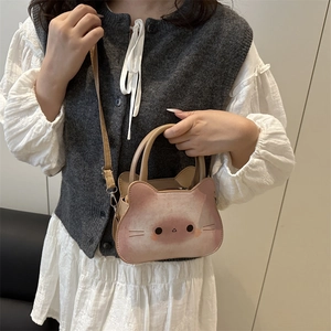 Sac bandoulière chic en forme de chat avec dégradé rose et beige et design félin