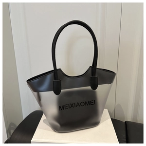 Detail of grey semi-transparent frosted PVC tote bag with MEIXIAOMEI text and black handles