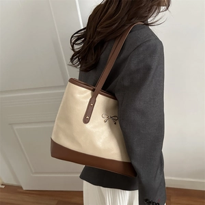 Damen Vintage Tote Bag in zweifarbigem Design mit Metallschleife und viel Platz