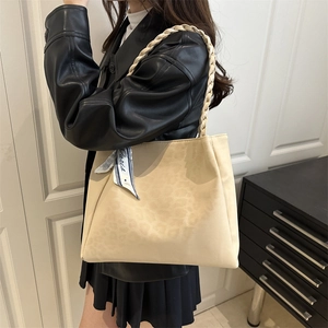 Fashionable leopard print faux suede tote bag with braided handle and silk scarf