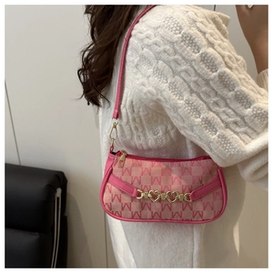Borsa a spalla rosa con trama jacquard 'M' e catena decorativa dorata a cuore