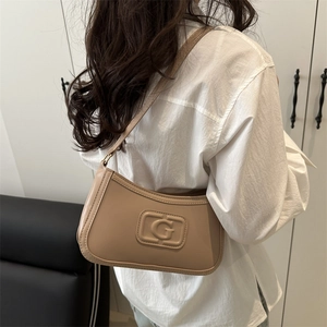 French style apricot leather baguette bag with embossed G logo for autumn fashion