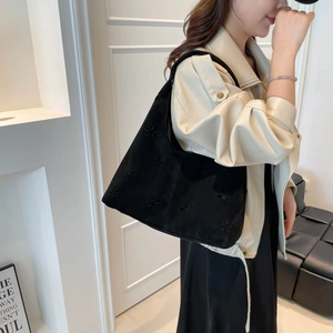 Black suede hobo shoulder bag with embroidered floral patterns and large capacity