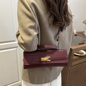 Retro burgundy crocodile embossed baguette bag with gold metal lock for women in autumn