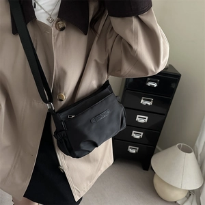 Chic black nylon crossbody square bag with adjustable strap for trendy casual street style