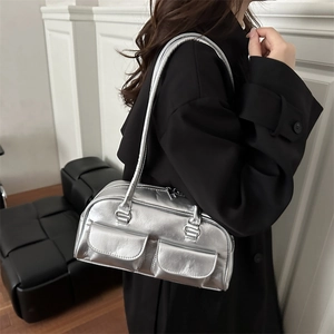 Metallic silver Boston shoulder bag with dual front pockets and sleek minimalist design