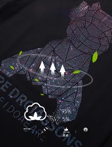 Detail of multi-color rhinestones geometric animal print on 95% cotton black t-shirt