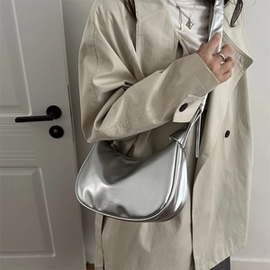 Silver crescent shoulder bag with mirror finish and D&S BAGS logo for 2025 trendy women
