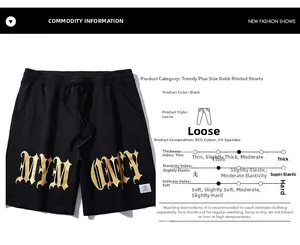 Detail of black cotton shorts featuring gold foil MYM ONLY lettering and adjustable drawstring