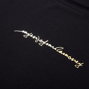 Plus size black cotton T-shirt featuring high-quality gold foil artistic text printing