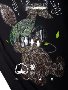 Detail of multi-color rhinestone bear graphic on 95% cotton black oversized t-shirt