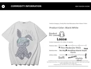 Detail of white oversized cotton T-shirt featuring rhinestone rabbit graphic and 95% cotton label