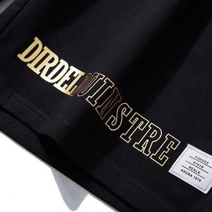 Short large noir pour homme avec imprimé doré DIRDELINSTRE et étiquette de style