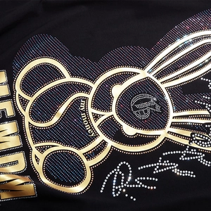 Oversized black cotton T-shirt featuring a stylized rhinestone rabbit and my money text